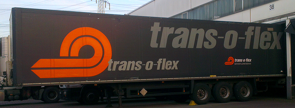 Auflegerbeschriftung für die Firma Trans-o-flex aus Stuttgart